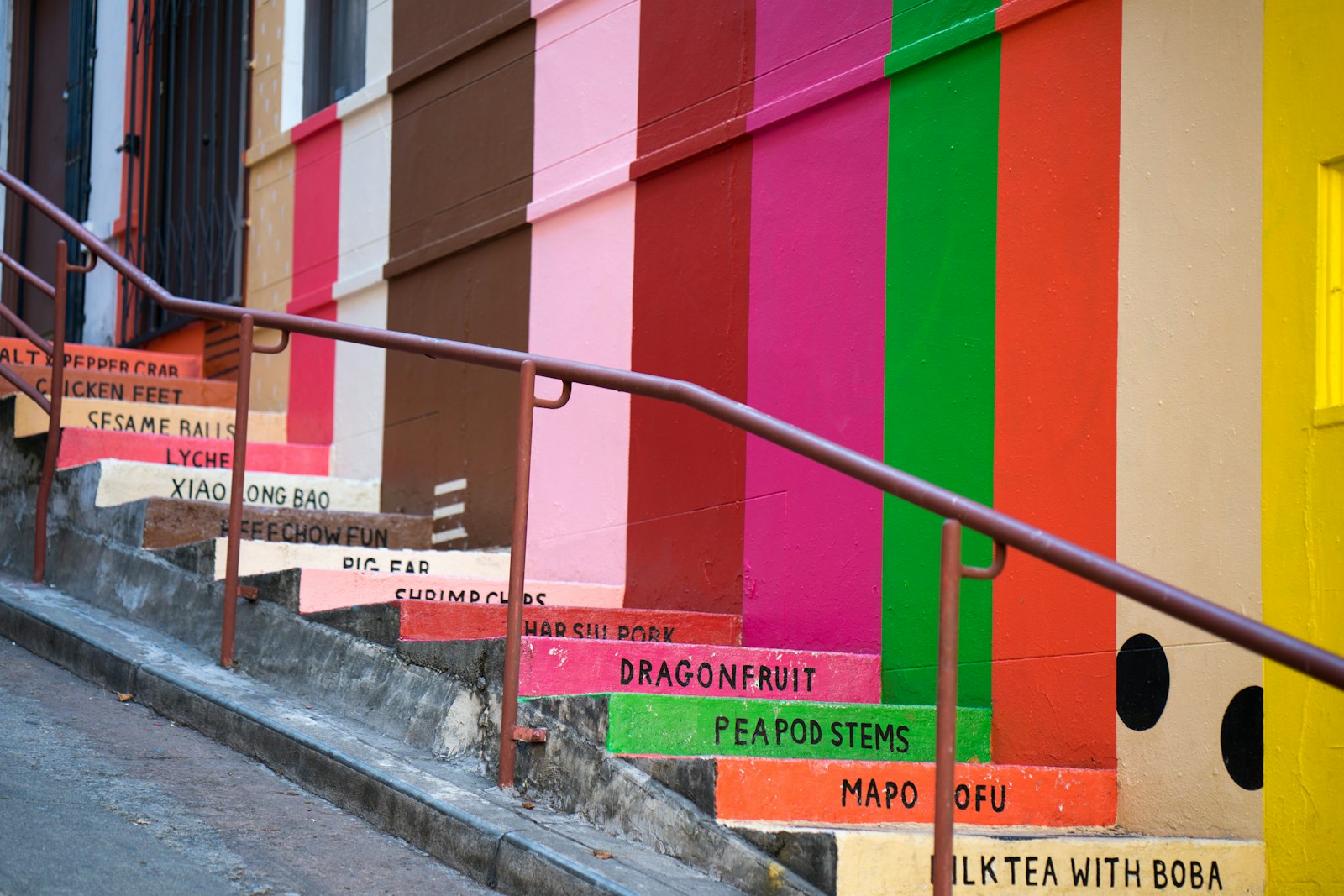 ZEISS Batis 85mm F1.8 sample photo. Multicolored staircase with railings photography