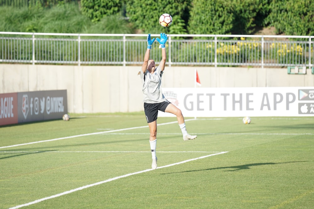 woman playing soccer ball