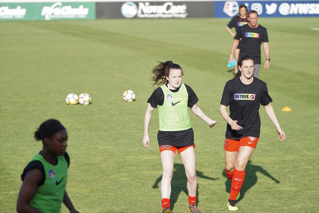 people playing soccer, She played the first half. She appeared to have pain and was walking slowly out to the bench duri