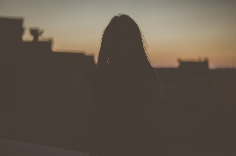 silhouette of woman standing