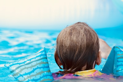 person in body of water faceless google meet background