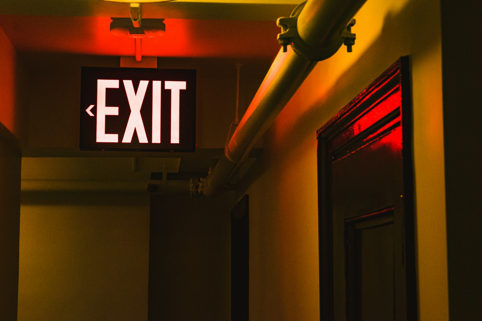 Fujifilm X-T1 + Fujifilm XF 50mm F2 R WR sample photo. Exit led sign photography