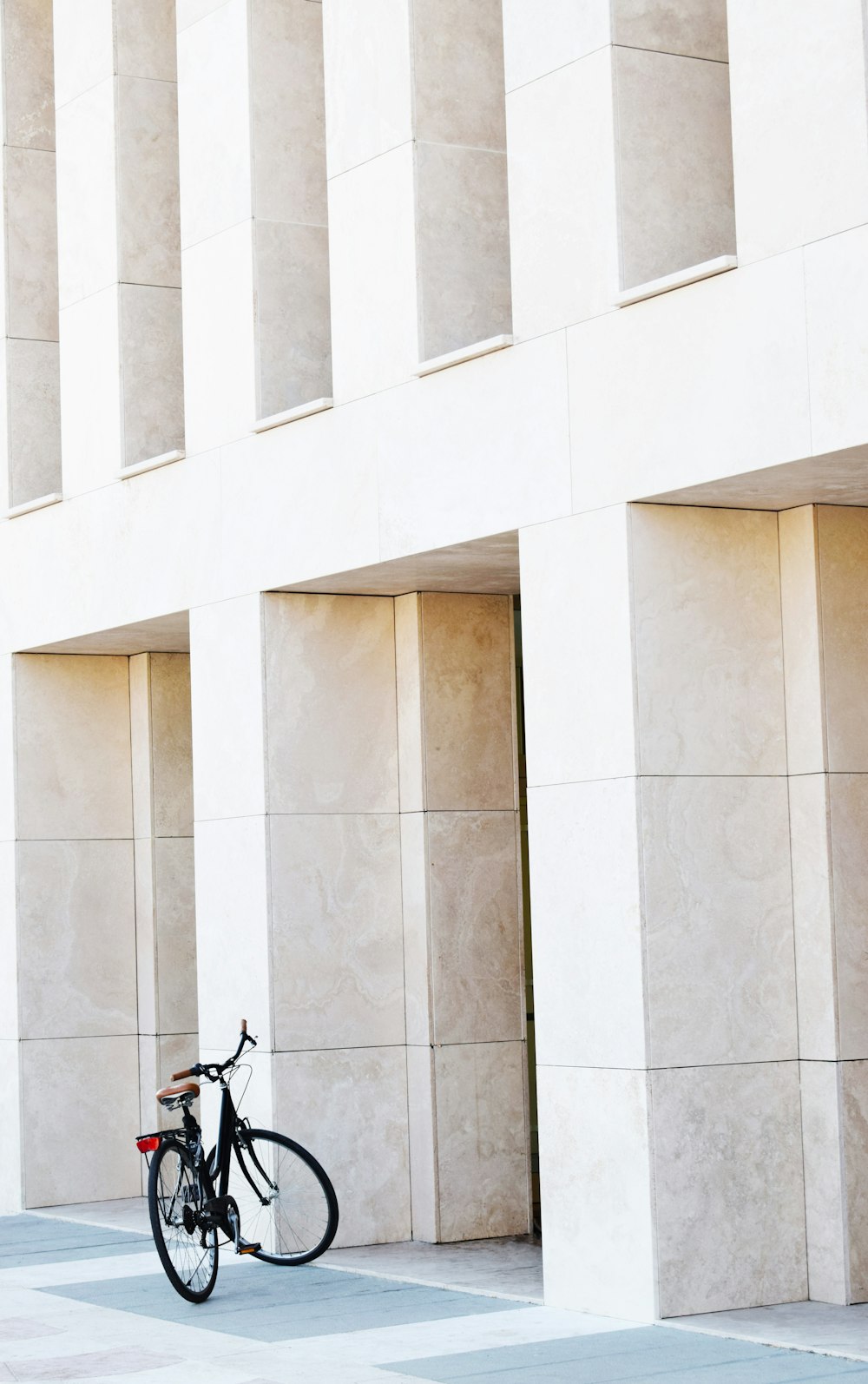 black bicycle under sunny sky