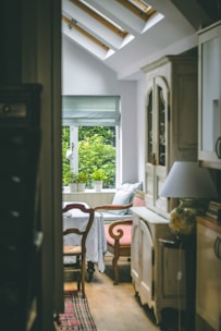 A cozy farmhouse-style dining area with rustic wooden table and soft natural light.