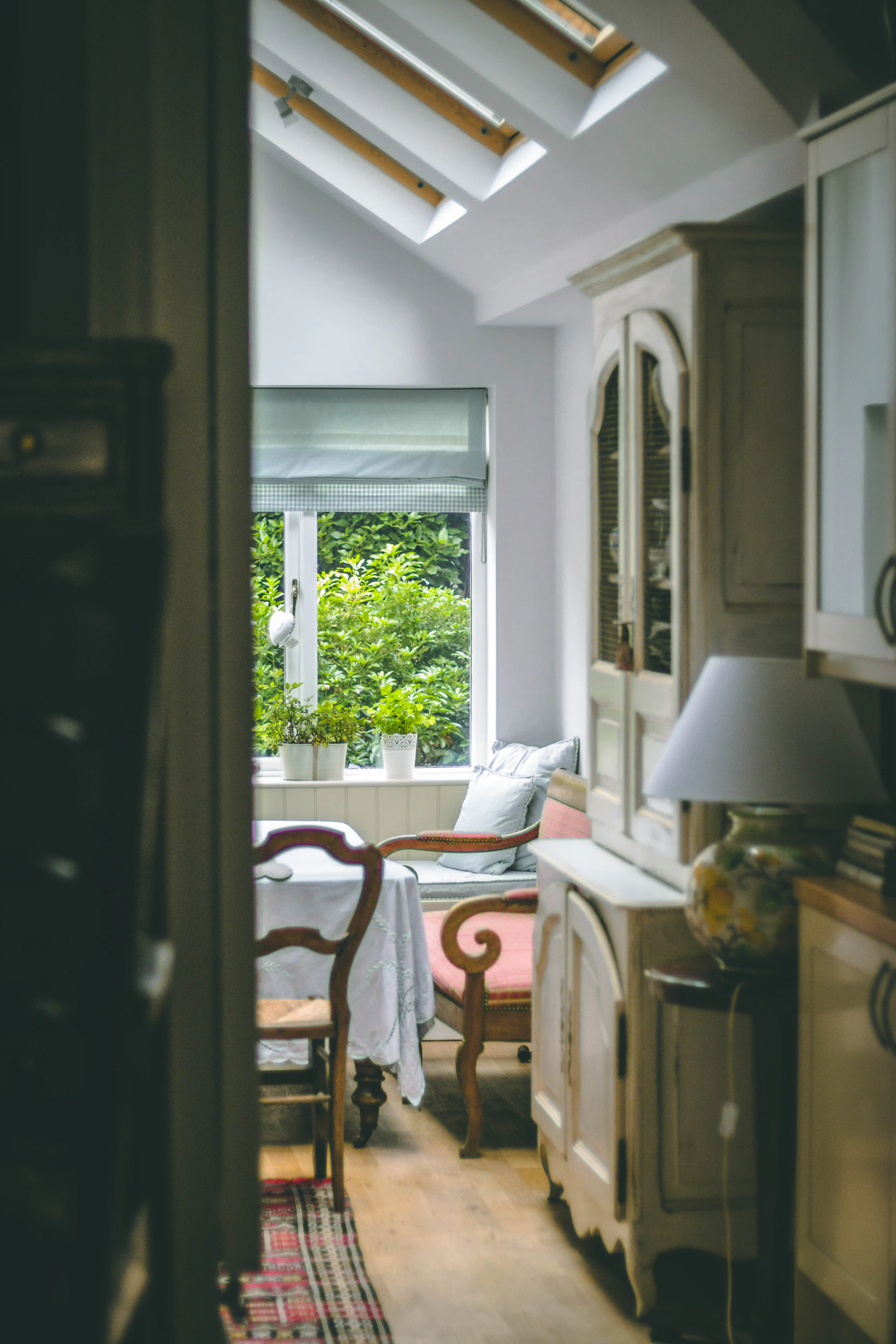A cozy family dining area with stylish decor and natural light, ready for a relaxing meal.