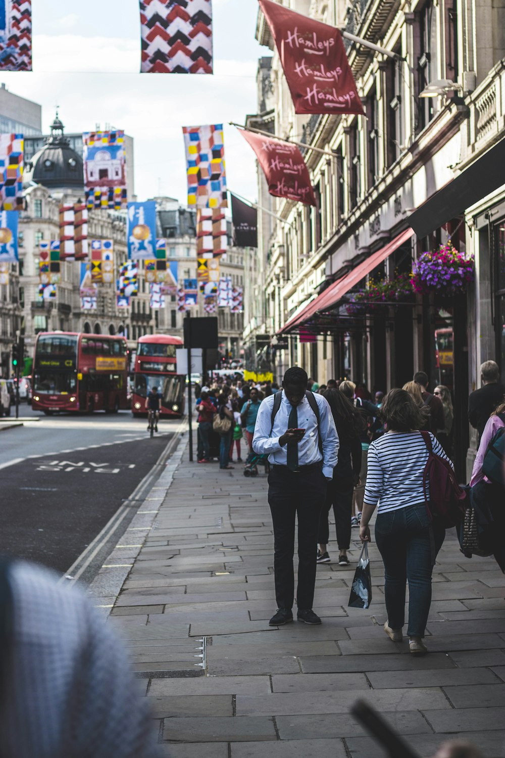 people walking beside the street