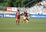 A vibrant soccer match with players in action.
