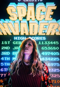 woman standing in signage