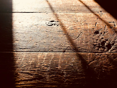 Close-up of a freshly treated wooden floor showcasing a subtle textured finish to prevent slipping.