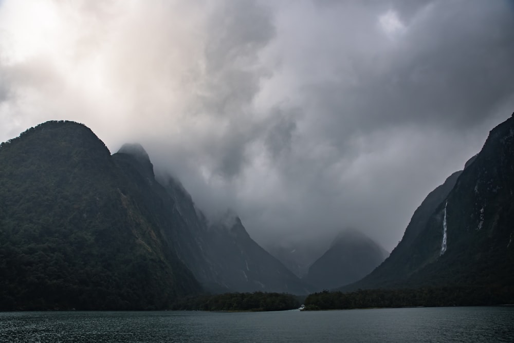 green mountain under gray cloudy sky