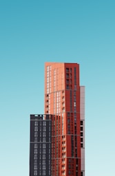orange and black high rise building
