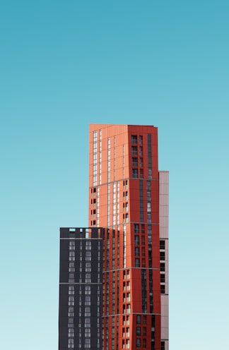 orange and black high rise building