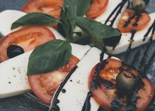 closeup photo of tofu and tomato slices