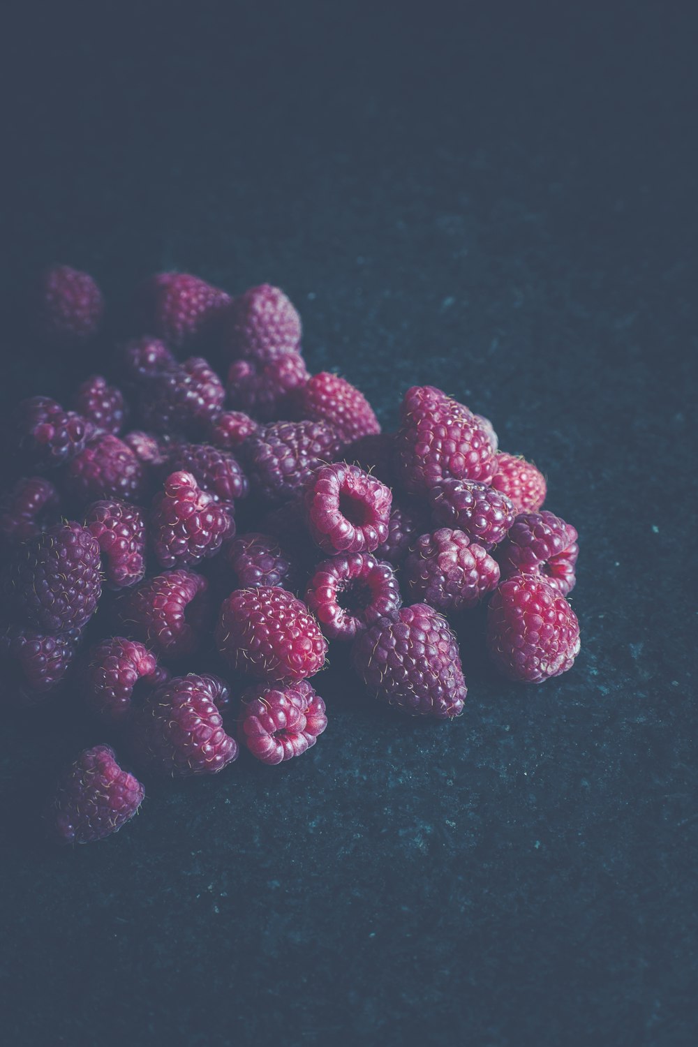 red raspberries on table