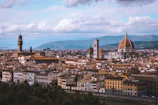 A panoramic view of a Silk Road cityscape with historic landmarks under a clear sky.