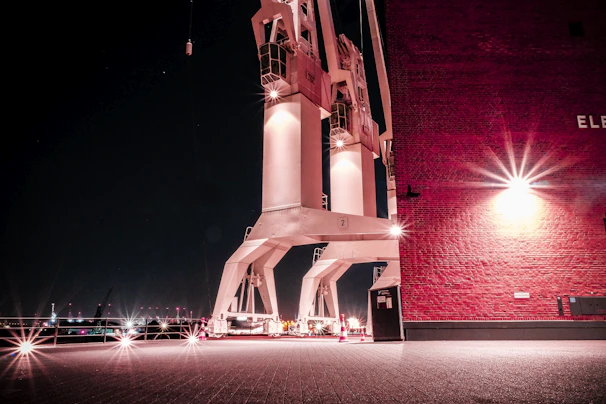 Nighttime operation of the crane with bright safety lights and secure setup