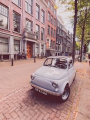 A group of microcars in a city environment.