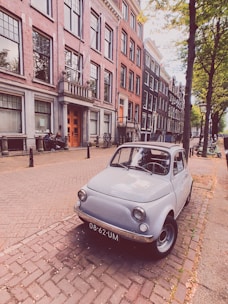 A group of microcars in a city environment.