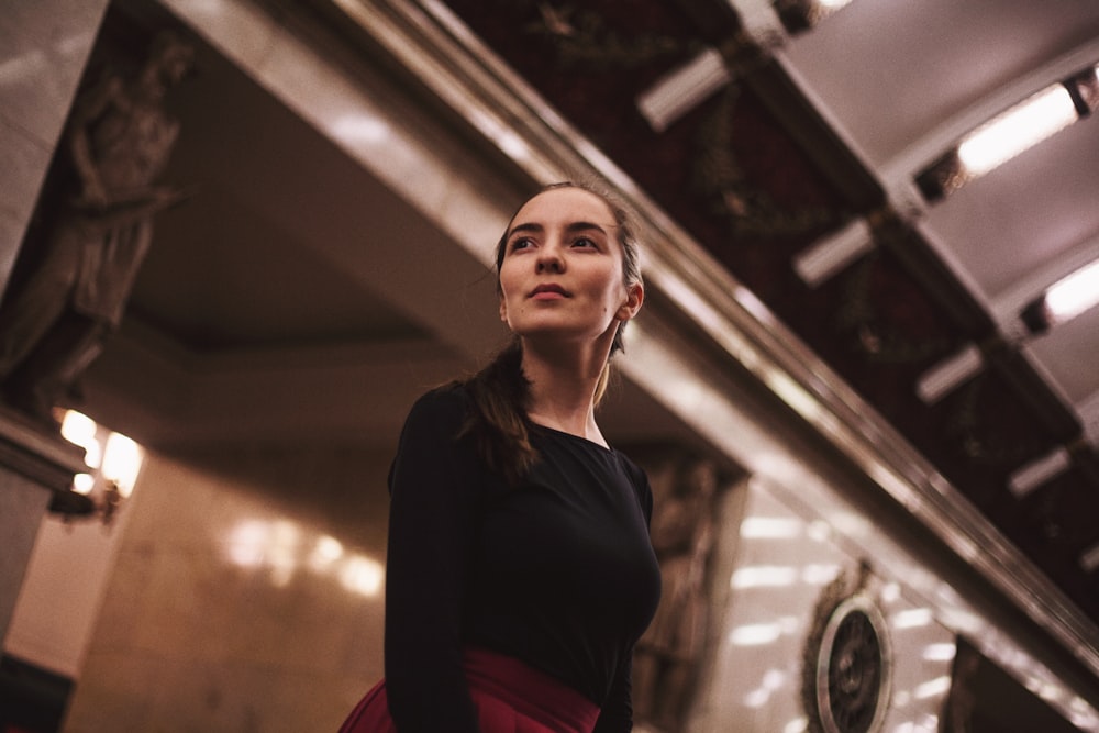 selective focus photography of woman in black top