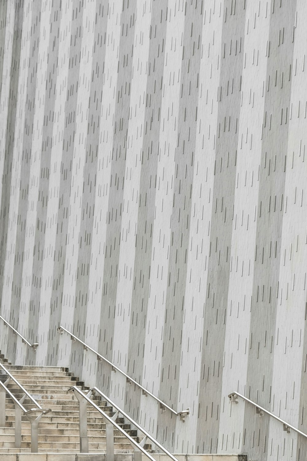 gray staircase near wall