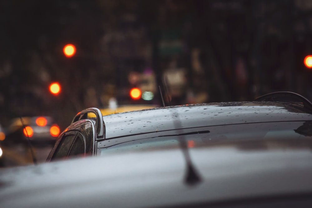 close-up photography of black car's roof