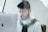 man facing MacBook Pro