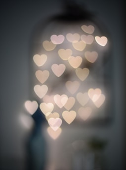 multiple blurry heart shaped lights