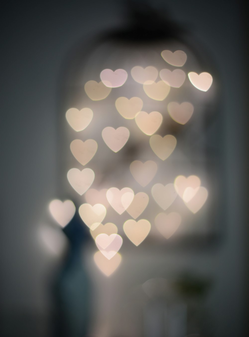 multiple blurry heart shaped lights