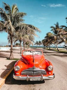 orange car on asphalt road