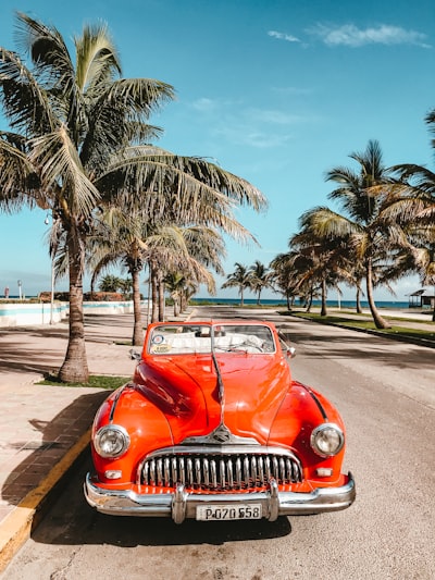 orange car on asphalt road