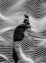 woman raising both arms with stripe light color