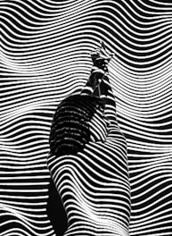 woman raising both arms with stripe light color