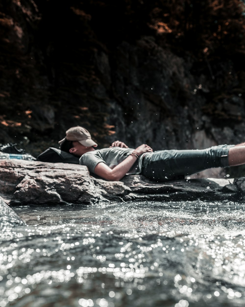 person sleeping on river