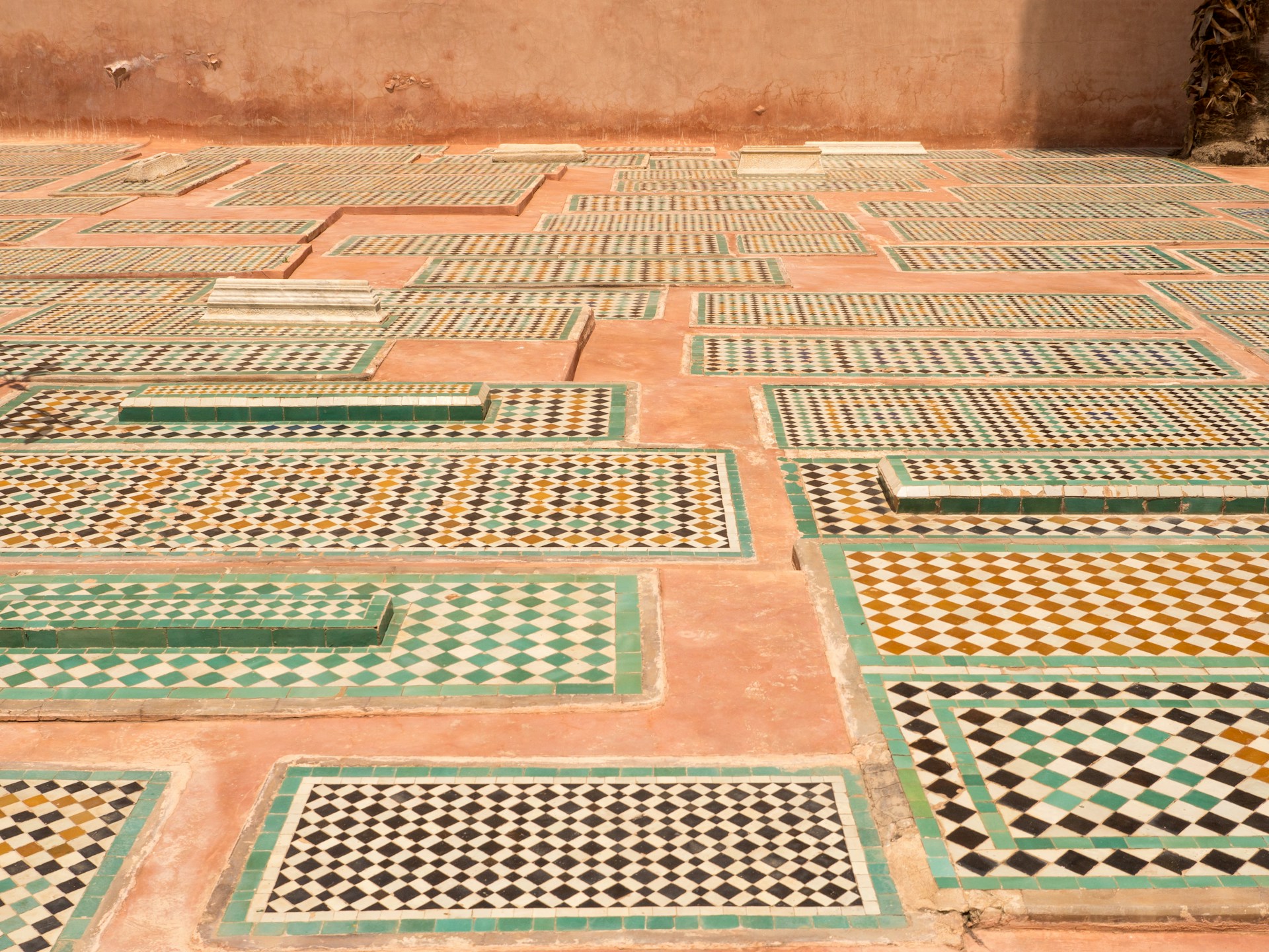 woman wearing yellow long-sleeved dress under white clouds and blue sky during daytime
