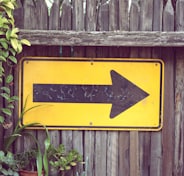 yellow arrow signage