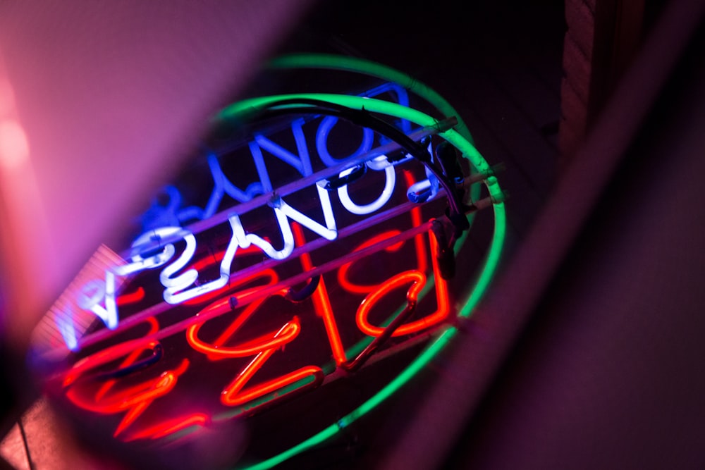 red, white, and blue neon signage