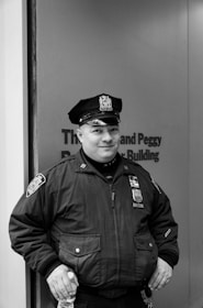 grayscale photography of police man