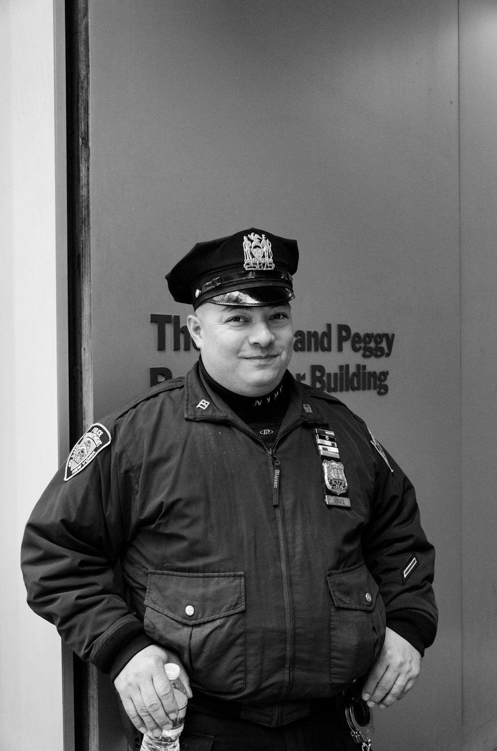 grayscale photography of police man