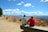 A happy couple enjoying the stunning view of the Grand Canyon during a Lillys Travel Tour.