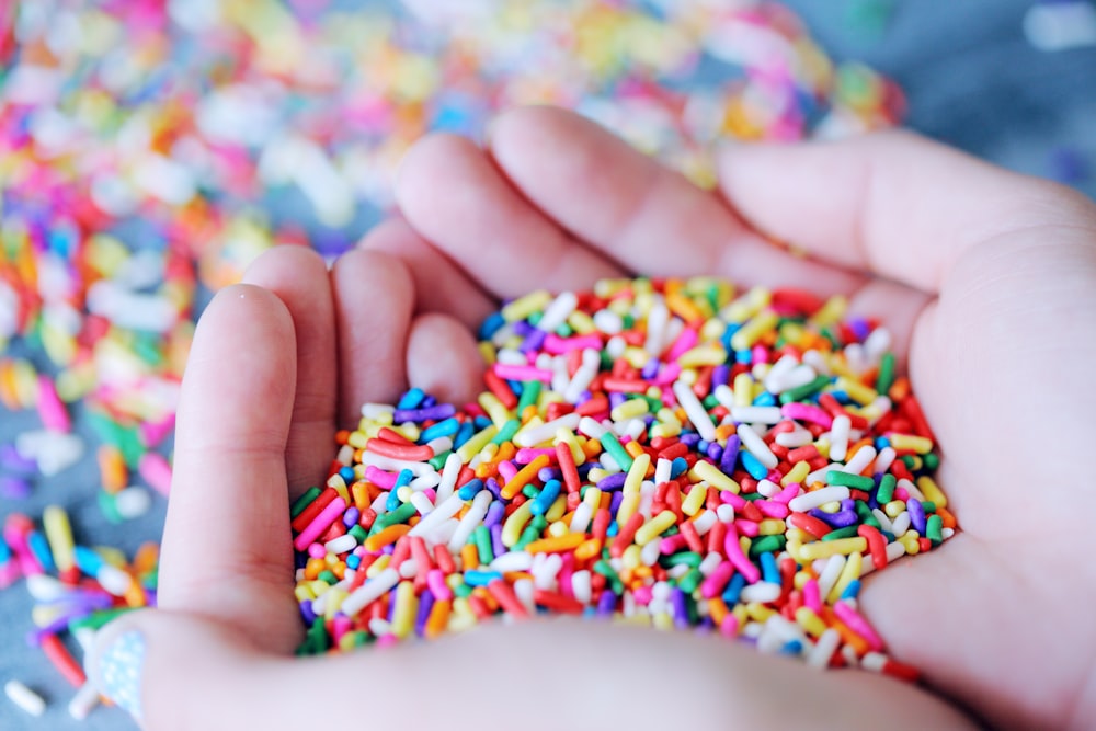 person holding sprinkles