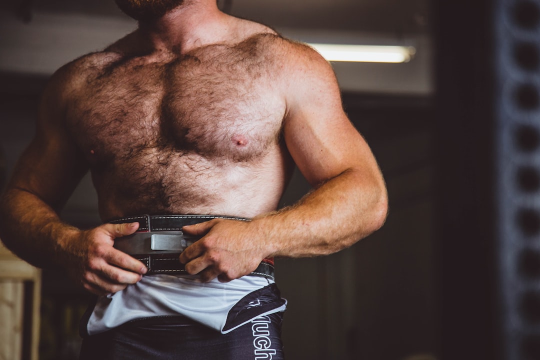 man wearing sauna belt,