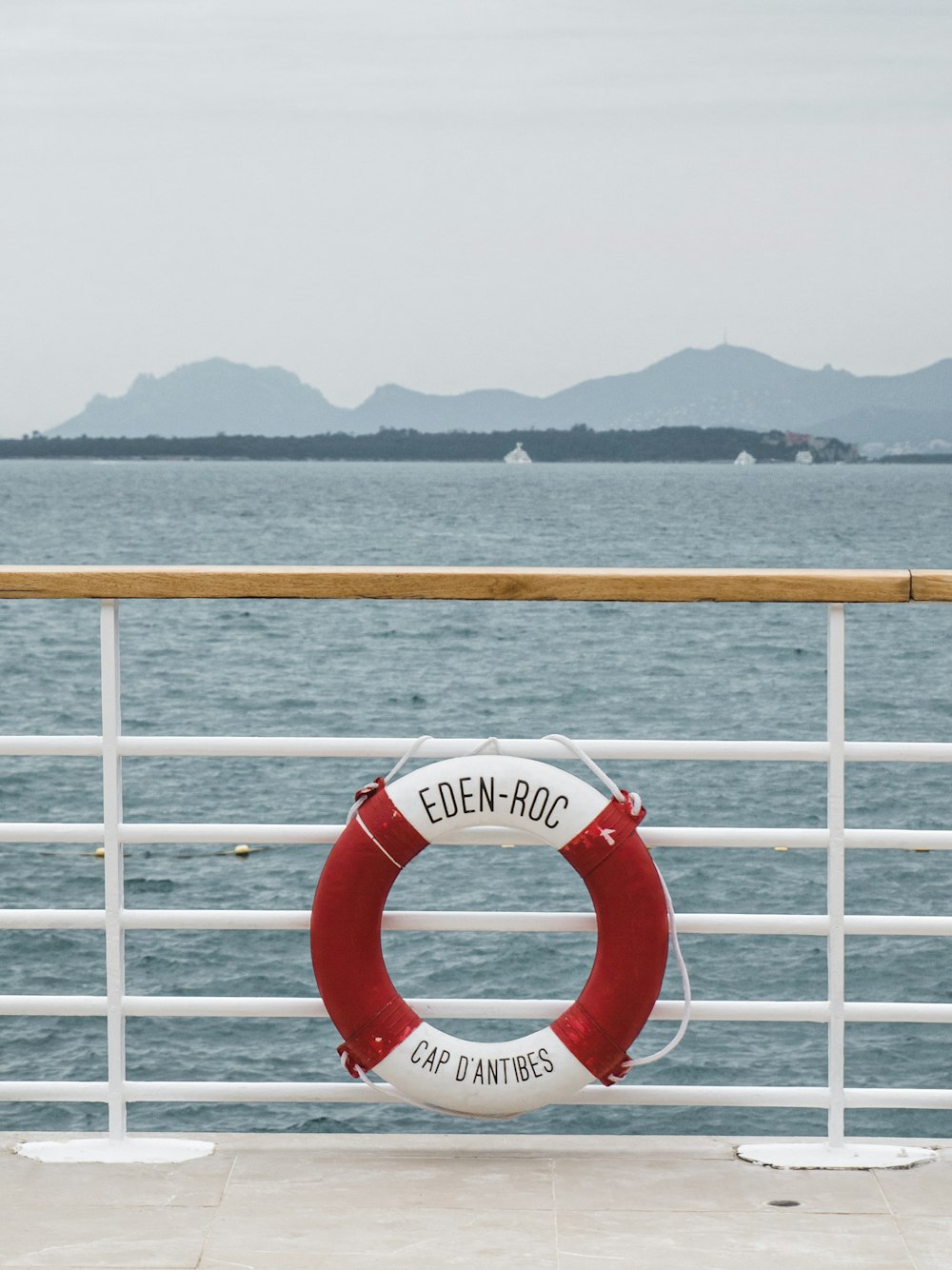 white and red swimming ring