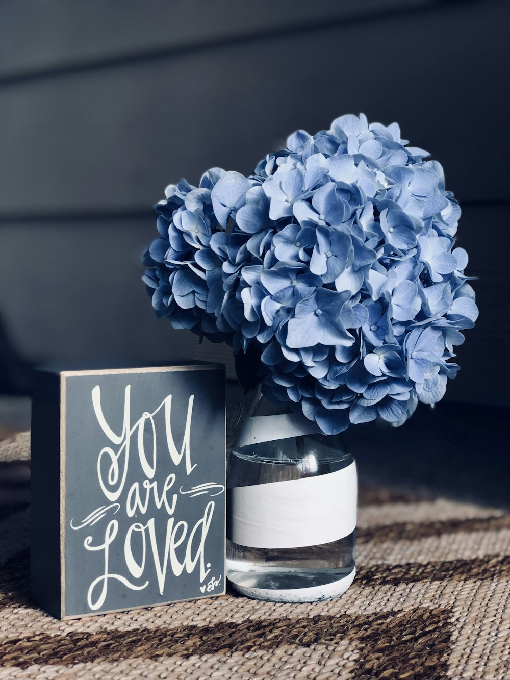 blue flowers in glass vase