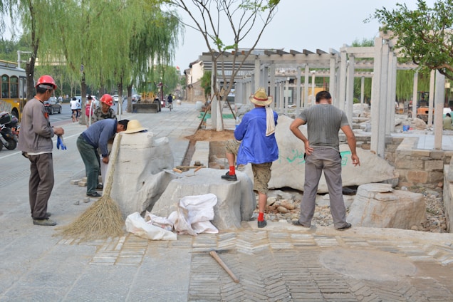 A diverse group of professionals collaborating on a construction project.