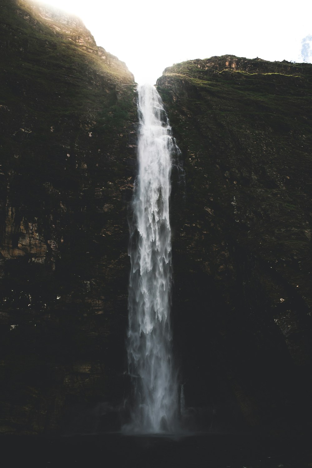 waterfalls in between of rock formation