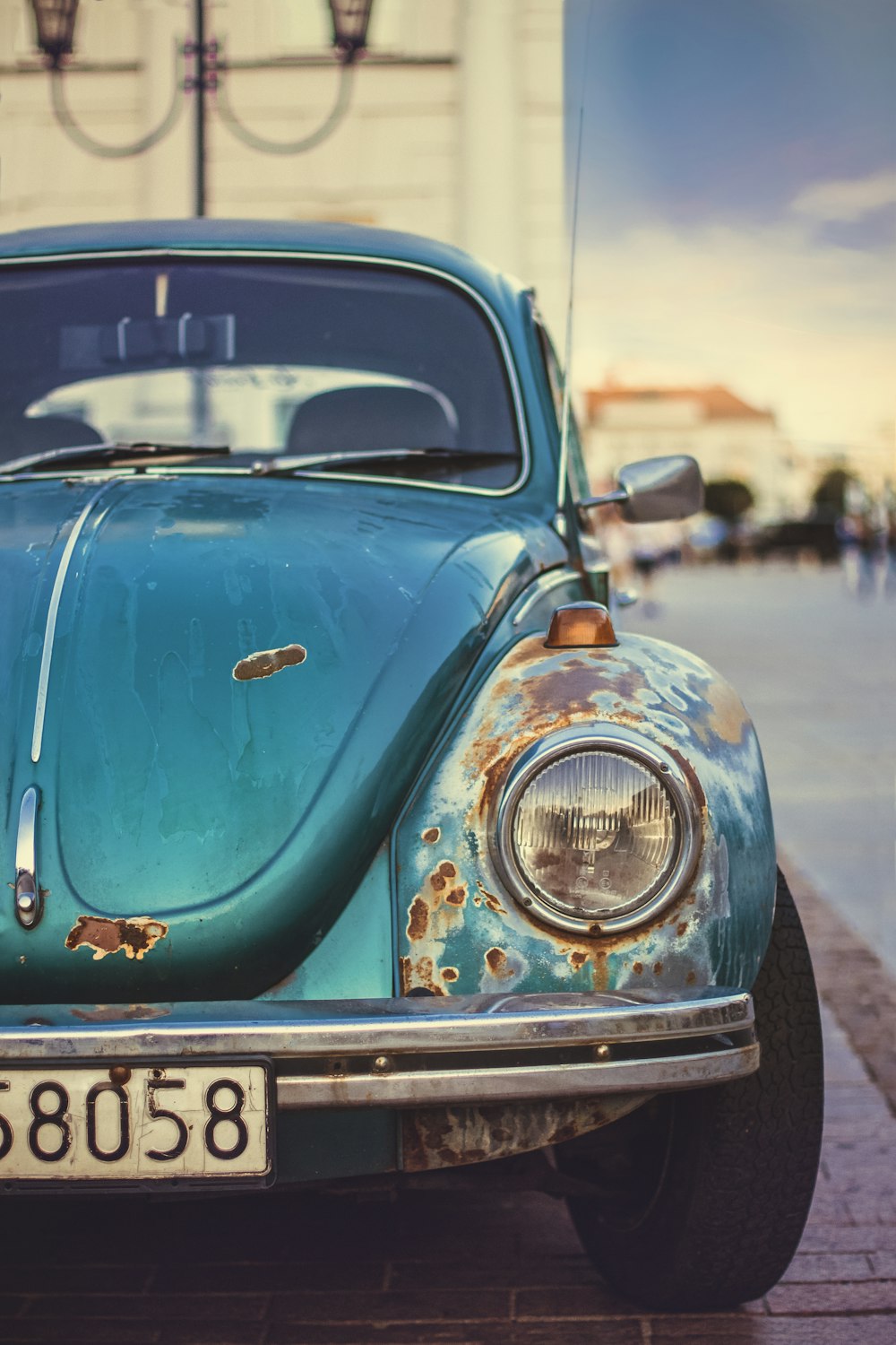 blue Volkswagen Beetle close-up photo