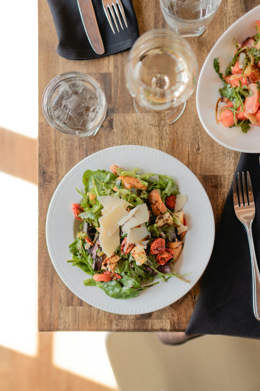 bowl of vegetable salad on wooden surface