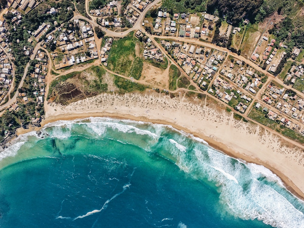 high-angle photography of ocean and landscape