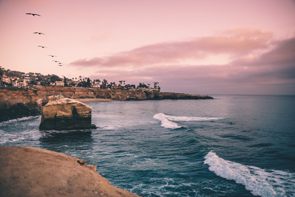 body of water during golden hour