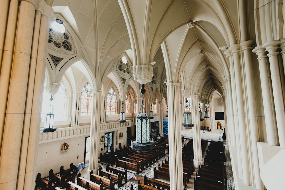 brown pew benches inside cathedral